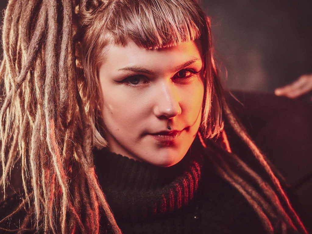 young-attractive-woman-with-dreadlocks-BU9YDBH